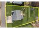 Aerial view of a home with a spacious backyard, wooden deck, play set, shed, and fenced in yard. Property lines are estimated at 7520 Berkeley W Rd, Denver, NC 28037