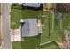 Aerial view of a home with a spacious backyard, wooden deck, play set, shed, and fenced in yard at 7520 Berkeley W Rd, Denver, NC 28037