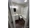 Bathroom features a vanity with a mirror and an enclosed tub with shower at 7520 Berkeley W Rd, Denver, NC 28037