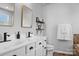 Modern bathroom with double vanity and tiled floors at 7520 Berkeley W Rd, Denver, NC 28037