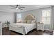 Elegant Primary bedroom with a large bed and neutral tones at 7520 Berkeley W Rd, Denver, NC 28037