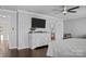Bright bedroom with large TV and dresser at 7520 Berkeley W Rd, Denver, NC 28037