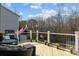 Inviting deck with outdoor seating, grill, and potted plants, perfect for relaxation and entertaining at 7520 Berkeley W Rd, Denver, NC 28037