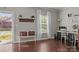 Inviting entryway with stylish bench, coat rack, and bright natural light from the front door and large window at 7520 Berkeley W Rd, Denver, NC 28037