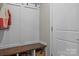 Functional entryway with built-in bench and storage at 7520 Berkeley W Rd, Denver, NC 28037