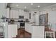 Modern kitchen with stainless steel appliances and granite countertops at 7520 Berkeley W Rd, Denver, NC 28037
