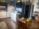 Functional kitchen with dark countertops, blue cabinets, tile backsplash, and appliances, creating a practical cooking space at 941 10Th St # 3, Lancaster, SC 29720