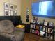 Relaxing living room featuring a comfortable recliner, media center, and wall decorations, creating a cozy space at 941 10Th St # 3, Lancaster, SC 29720