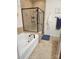 Bathroom featuring a shower, soaking tub, and stylish fixtures at 1035 Crescent Moon Dr, Fort Mill, SC 29715