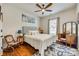 Bedroom with wooden floors, area rug, and vintage vanity table at 1035 Crescent Moon Dr, Fort Mill, SC 29715