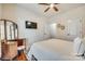 Bright bedroom with neutral walls, hardwood floors, and elegant furniture offers a comfortable and inviting space at 1035 Crescent Moon Dr, Fort Mill, SC 29715