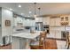 Beautiful kitchen with marble countertops, white cabinetry, and stainless steel appliances at 1035 Crescent Moon Dr, Fort Mill, SC 29715