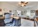 Spacious office with hardwood floors, stylish desk, comfortable chair and natural light at 1035 Crescent Moon Dr, Fort Mill, SC 29715