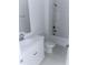 Clean bathroom with white vanity, tub, and tile flooring at 1054 Bull Dog Ln, Wingate, NC 28174