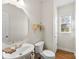 Bathroom with single sink vanity and octagonal mirror at 132 Trotter Ridge Dr, Mooresville, NC 28117