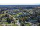 Aerial view showcasing the home's location within a large neighborhood with mature trees and well maintained roads at 2216 Lowell Bethesda Rd, Gastonia, NC 28056