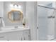 A bright bathroom with a sleek vanity, modern fixtures, and a stylish mirror, offering a refreshing space at 2216 Lowell Bethesda Rd, Gastonia, NC 28056