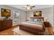Stylishly furnished bedroom with a large bed, wooden furniture, and cozy decor, creating a relaxing retreat at 2216 Lowell Bethesda Rd, Gastonia, NC 28056