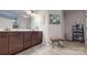 Elegant bathroom featuring double vanity sinks, a large mirror, and stylish tile flooring at 280 Kerri Dawn Ln, Locust, NC 28097