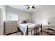Cozy bedroom with a full-size bed, wood floors, and natural light at 280 Kerri Dawn Ln, Locust, NC 28097