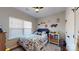 Charming bedroom with a twin bed, wood floors, and toys at 280 Kerri Dawn Ln, Locust, NC 28097