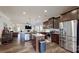Spacious kitchen with stainless steel appliances, large island, and open layout to the living area at 280 Kerri Dawn Ln, Locust, NC 28097