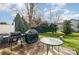 Backyard patio with a grill and outdoor table at 284 Garnet Ct, Fort Mill, SC 29708