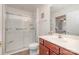 Bathroom with shower, sink, and neutral colors including white subway tile and neutral tile flooring at 284 Garnet Ct, Fort Mill, SC 29708