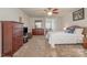 Spacious bedroom offering natural light, ceiling fan, and dresser storage at 284 Garnet Ct, Fort Mill, SC 29708