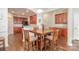 Open dining area showcasing hardwood floors and easy access to the kitchen at 284 Garnet Ct, Fort Mill, SC 29708