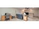 Upstairs loft space featuring computer desk, couch, and media center at 284 Garnet Ct, Fort Mill, SC 29708