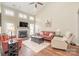 Bright and spacious living room with vaulted ceilings, fireplace, and hardwood flooring at 284 Garnet Ct, Fort Mill, SC 29708