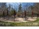 Community outdoor patio area with tables, chairs, and fireplace at 284 Garnet Ct, Fort Mill, SC 29708