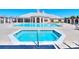 Resort style pool with adjacent hot tub at 284 Garnet Ct, Fort Mill, SC 29708