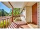Cozy front porch with wooden railings and a charming entryway to the home at 5320 Liberty Hill W Rd, York, SC 29745