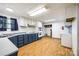 Functional kitchen with white cabinets and a window for natural light, ideal for cooking at 5320 Liberty Hill W Rd, York, SC 29745