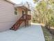 Back porch with wooden stairs, providing a private entrance to the home at 1209 Moretz Ave, Charlotte, NC 28206