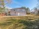 Large backyard with a patio and ample room for outdoor activities and relaxation at 1209 Moretz Ave, Charlotte, NC 28206