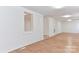 Spacious basement with painted brick walls and an open layout at 1209 Moretz Ave, Charlotte, NC 28206