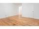 Bedroom featuring light-colored wood floors and white trim at 1209 Moretz Ave, Charlotte, NC 28206