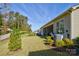 House with a screened porch and well-manicured lawn at 14535 Crosswater Ln, Charlotte, NC 28278