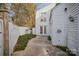 Private patio and fenced backyard with small garden at 7141 Stonington Ln, Charlotte, NC 28227