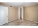 Cozy bedroom with neutral walls and carpet at 7141 Stonington Ln, Charlotte, NC 28227