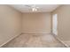 Well-lit bedroom with window and ceiling fan at 7141 Stonington Ln, Charlotte, NC 28227