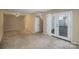 Dining area with patio doors and neutral carpeting at 7141 Stonington Ln, Charlotte, NC 28227