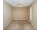 Spacious dining area with ceiling fan and kitchen access at 7141 Stonington Ln, Charlotte, NC 28227