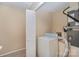 Functional laundry room with washer, dryer, and storage at 7141 Stonington Ln, Charlotte, NC 28227