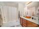 Clean bathroom with double sinks and a bathtub at 14423 Glendon Hall Ln, Charlotte, NC 28262