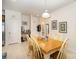 Kitchen features a dining area with a table and chairs for six at 14423 Glendon Hall Ln, Charlotte, NC 28262