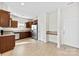 Bright kitchen featuring stainless steel appliances, granite counters, and tile flooring at 14423 Glendon Hall Ln, Charlotte, NC 28262